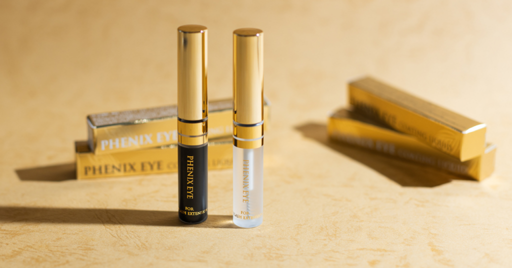 コーティングリキッドのクリアとブラックがパッケージを背景に並んでいるイメージ画像